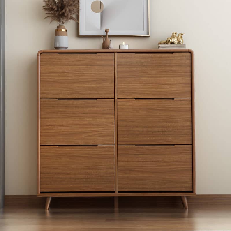 Shoe cabinet with slanted shelves