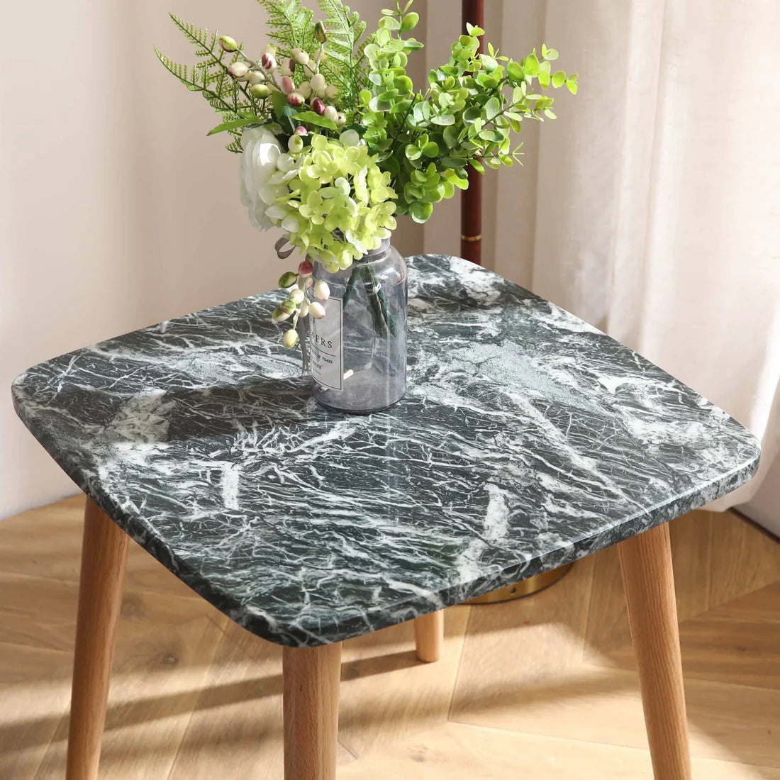 Modern marble top table with wooden legs